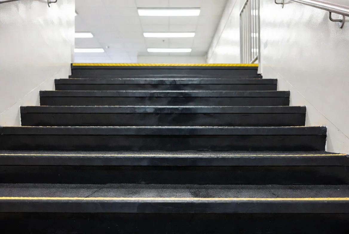 Rubber stair treads in a stairwell